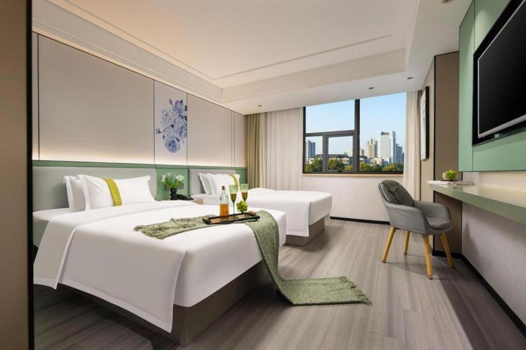 Kaibin International Hotel Jingdezhen Bagian luar foto